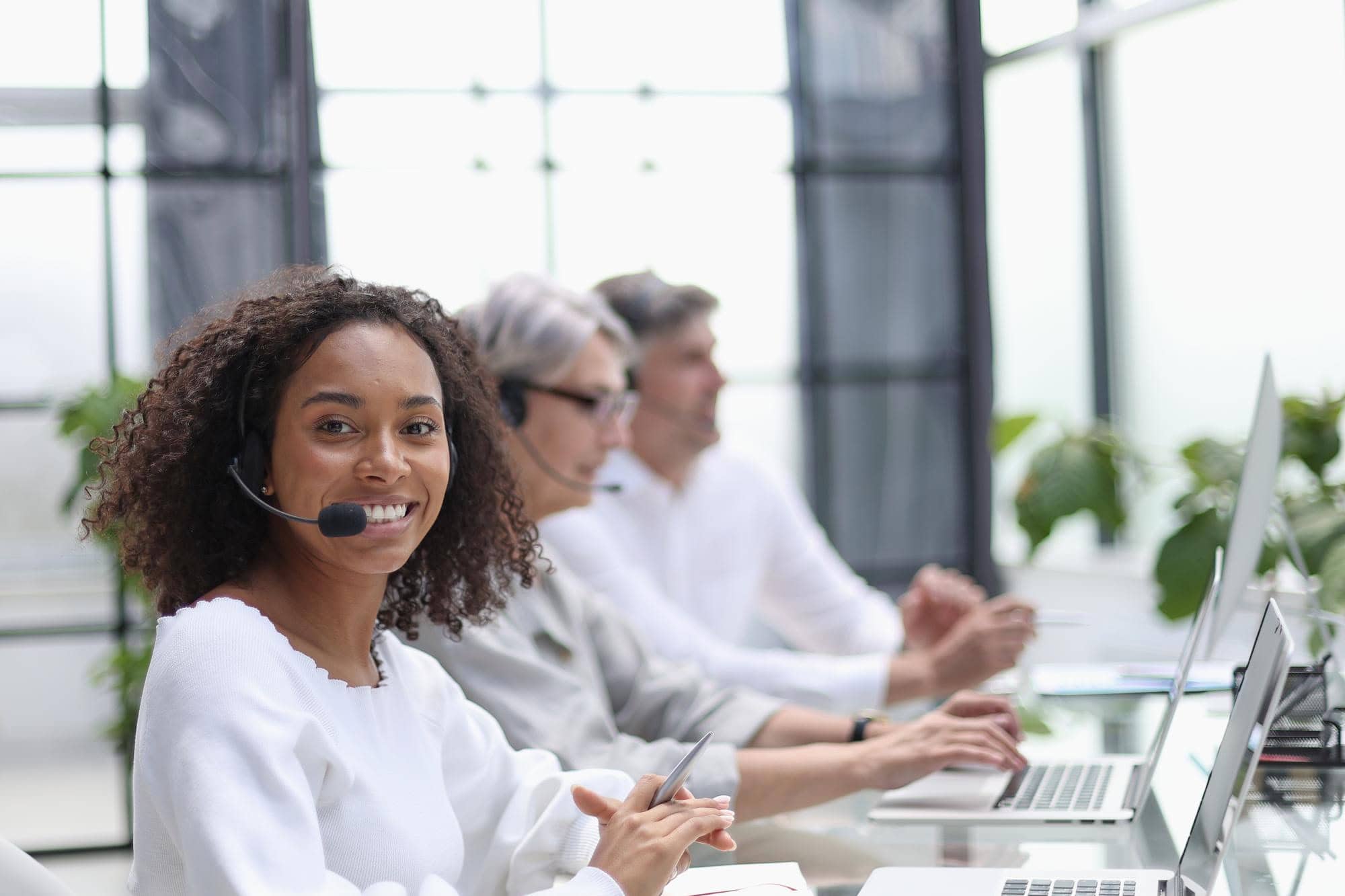 african american operator smiling call center