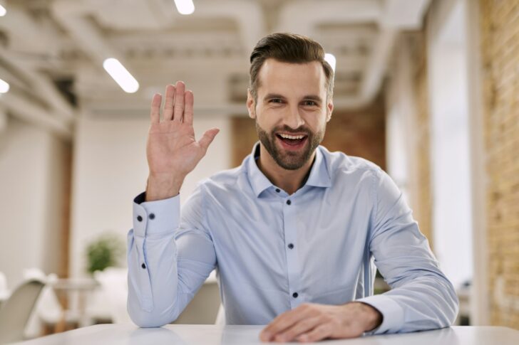 Mirthful HR director welcoming new employee to the team